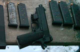 Handgun 1911 with ammo